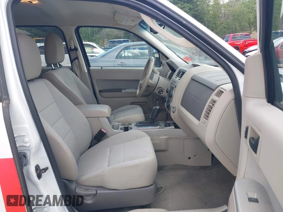 2011 Ford Escape Hybrid с VIN 1FMCU5K39BKC06037, выставлен на аукционе IAAI как лот 42610310 с пробегом 198 549 миль миль и . История ставок и продаж доступна на DreamBid. Изображение 5.
