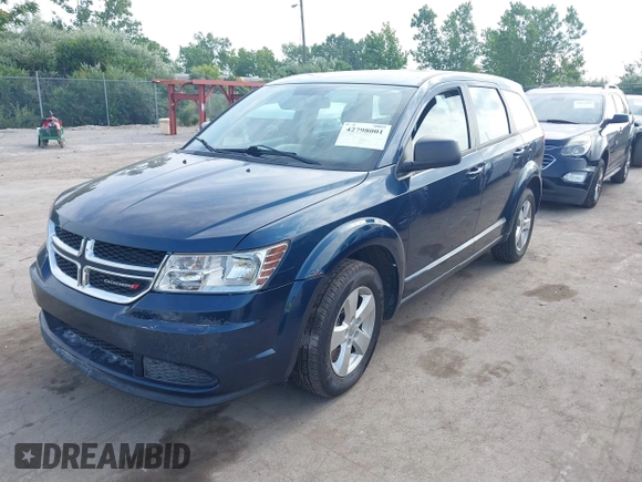 2013 Dodge Journey American Value with VIN 3C4PDCAB2DT529530, listed as a IAAI auction lot 42798001 with Not provided miles and . Bid and sale history available at DreamBid. Image 2.