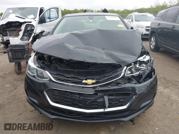 2017 Chevrolet Cruze LS z VIN 1G1BC5SM2H7223276, wystawiony jako IAAI lot #42188962 z przebiegiem 102 796 mil mil oraz . Historia ofert i sprzedaży dostępna na DreamBid. Obrazek 13.