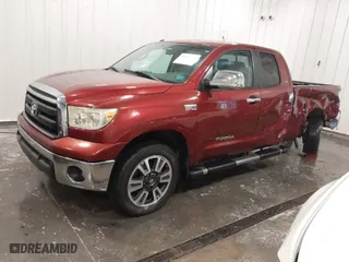 2010 Toyota Tundra 4WD Truck with VIN 5TFUW5F16AX113067, listed as a IAAI auction lot 41826361 with 128,279 mi miles. Bid and sale history available at carsss.com. Image 2.