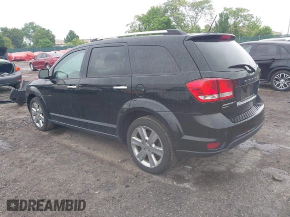 2014 Dodge Journey Limited with VIN 3C4PDDDG4ET141164, listed as a IAAI auction lot 42255057 with 195,135 mi miles and . Bid and sale history available at DreamBid. Image 3.