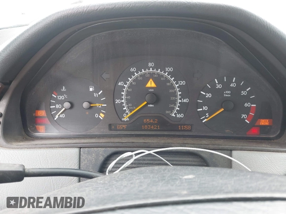 1999 Mercedes-Benz E-Class with VIN WDBJH65F5XA721205, listed as a IAAI auction lot 42068204 with 183,421 mi miles. Bid and sale history available at carsss.com. Image 7.