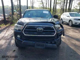 2019 Toyota Tacoma 4WD SR with VIN 3TMCZ5AN5KM221720, listed as a IAAI auction lot 41967986 with 83,701 mi miles. Bid and sale history available at carsss.com. Image 12.