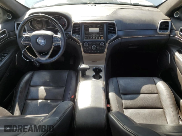 2015 Jeep Grand Cherokee Summit с VIN 1C4RJFJTXFC768298, выставлен на аукционе Copart как лот 52503035 с пробегом 170 364 миль миль и Списание • Salvage title. История ставок и продаж доступна на DreamBid. Изображение 8.