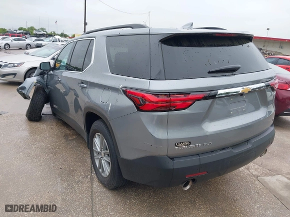 2023 Chevrolet Traverse LT Cloth with VIN 1GNEVGKW5PJ243297, listed as a IAAI auction lot 41960794 with 27,700 mi miles. Bid and sale history available at carsss.com. Image 3.