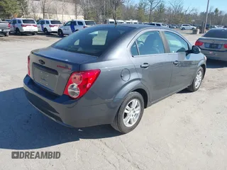2013 Chevrolet Sonic LT with VIN 1G1JC5SG5D4135971, listed as a IAAI auction lot 41762168 with 140,493 mi miles and . Bid and sale history available at DreamBid. Image 4.