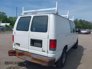 2014 Ford Econoline Cargo Commercial with VIN 1FTNE2EL6EDA22641, listed as a IAAI auction lot 42156425 with 233,745 mi miles. Bid and sale history available at carsss.com. Image 4.
