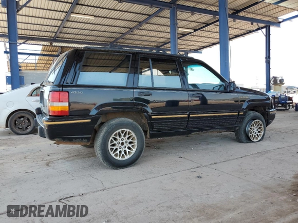 1994 Jeep Grand Cherokee Limited with VIN 1J4GZ78S5RC304501, listed as a Copart auction lot 64632335 with 184,333 mi miles and Salvage title. Bid and sale history available at DreamBid. Image 3.