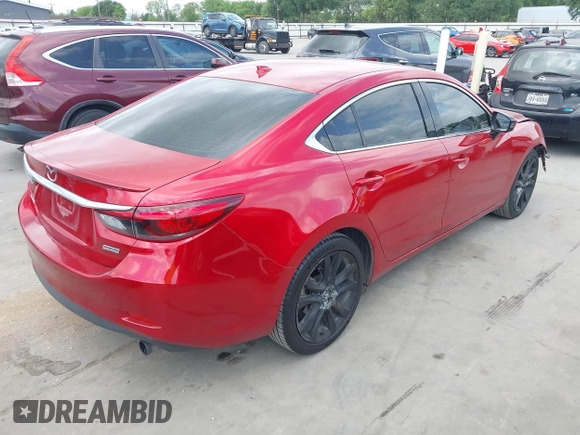 2016 Mazda 6 i Grand Touring z VIN JM1GJ1W58G1486694, wystawiony jako IAAI lot #42094443 z przebiegiem 77 803 mil mil oraz . Historia ofert i sprzedaży dostępna na DreamBid. Obrazek 4.
