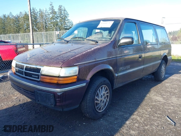 1993 Dodge Grand Caravan with VIN 1B4GK44R4PX675504, listed as a IAAI auction lot 42010737 with 219,886 mi miles and . Bid and sale history available at DreamBid. Image 2.
