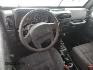 2003 Jeep Wrangler X with VIN 1J4FA39S93P315950, listed as a Copart auction lot 59563295 with Not provided miles and Salvage title. Bid and sale history available at DreamBid. Image 8.