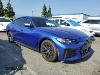 2024 BMW i4 M50 with VIN WBY33AW07RFS19600, listed as a Copart auction lot 53030904 with 1,985 mi miles and Salvage Title. Bid and sale history available at carsss.com. Image 4.