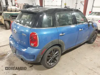 2013 MINI Countryman S ALL4 z VIN WMWZC5C59DWM16261, wystawiony jako IAAI lot #41563270 z przebiegiem 159 516 mil mil oraz . Historia ofert i sprzedaży dostępna na DreamBid. Obrazek 4.