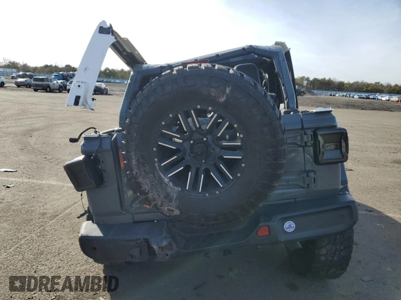 2019 Jeep Wrangler Unlimited Sahara with VIN 1C4HJXEG7KW573265, listed as a Copart auction lot 42683745 with 63,393 mi miles and Salvage title. Bid and sale history available at DreamBid. Image 6.