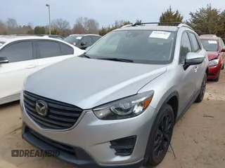 2016 Mazda CX-5 Grand Touring with VIN JM3KE4DY1G0616714, listed as a IAAI auction lot 41459781 with 90,763 mi miles. Bid and sale history available at carsss.com. Image 17.
