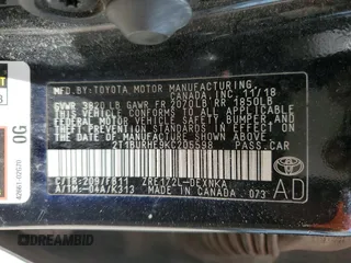 2019 Toyota Corolla L z VIN 2T1BURHE9KC205598, wystawiony jako Copart lot #56741185 z przebiegiem 201 573 mil mil oraz Szkoda całkowita • Salvage title. Historia ofert i sprzedaży dostępna na DreamBid. Obrazek 13.