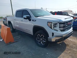 2023 GMC Sierra 1500 SLT with VIN 3GTUUDE88PG287914, listed as a IAAI auction lot 42394118 with 23,688 mi miles and . Bid and sale history available at DreamBid. Image 1.