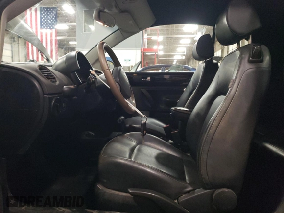 2009 Volkswagen Beetle S with VIN 3VWRG31Y49M406783, listed as a Copart auction lot 75182044 with 57,113 mi miles and Salvage title. Bid and sale history available at DreamBid. Image 7.