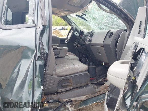 2004 Ford F-150 XL with VIN 1FTRF14W14NB97084, listed as a IAAI auction lot 42243709 with Not provided miles and . Bid and sale history available at DreamBid. Image 5.