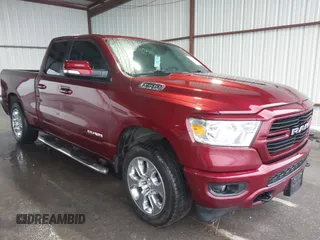 2021 Ram 1500 Big Horn z VIN 1C6SRFBTXMN537368, wystawiony jako IAAI lot #42183805 z przebiegiem 66 844 mil mil oraz . Historia ofert i sprzedaży dostępna na DreamBid. Obrazek 1.