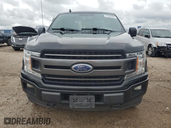 2018 Ford F-150 XL with VIN 1FTEW1EPXJFB04008, listed as a Copart auction lot 61062825 with 94,030 mi miles and Salvage title. Bid and sale history available at DreamBid. Image 5.