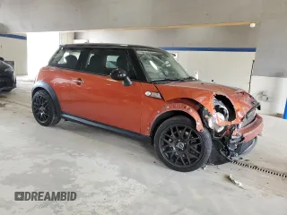 2013 MINI Hardtop S with VIN WMWSV3C52DT396176, listed as a Copart auction lot 59207165 with 104,194 mi miles and Salvage title. Bid and sale history available at DreamBid. Image 4.