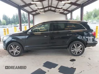 2015 Audi Q7 Premium Plus with VIN WA1LGAFE2FD020974, listed as a IAAI auction lot 42053103 with 107,013 mi miles and . Bid and sale history available at DreamBid. Image 14.