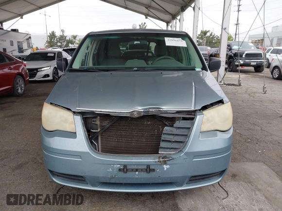 2008 Chrysler Town & Country LX with VIN 2A8HR44H38R831695, listed as a IAAI auction lot 42096656 with 254,424 mi miles and . Bid and sale history available at carsss.com. Image 12.
