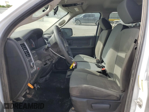2023 Ram 1500 Express with VIN 3C6RR7KT9PG658247, listed as a Copart auction lot 57168235 with 30,253 mi miles and Salvage title. Bid and sale history available at DreamBid. Image 7.