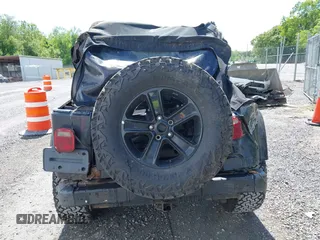 2003 Jeep Wrangler Sport z VIN 1J4FA49S53P317779, wystawiony jako IAAI lot #42388780 z przebiegiem Nie podano mil oraz . Historia ofert i sprzedaży dostępna na DreamBid. Obrazek 15.