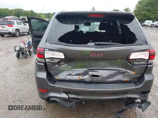 2017 Jeep Grand Cherokee Trailhawk with VIN 1C4RJFLG2HC645209, listed as a IAAI auction lot 42348470 with 170,905 mi miles and . Bid and sale history available at DreamBid. Image 6.