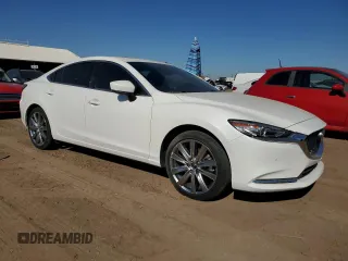 2021 Mazda 6 Signature with VIN JM1GL1XY5M1614601, listed as a Copart auction lot 73769893 with 22,617 mi miles and . Bid and sale history available at DreamBid. Image 4.