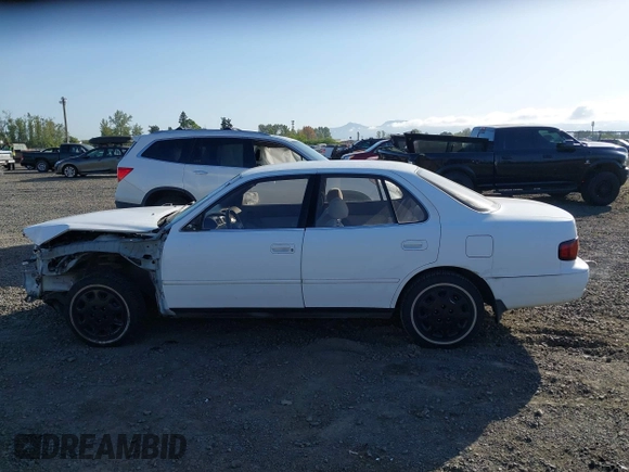 1995 Toyota Camry LE z VIN JT2SK12E5S0332027, wystawiony jako IAAI lot #42078977 z przebiegiem 128 929 mil mil oraz . Historia ofert i sprzedaży dostępna na DreamBid. Obrazek 15.