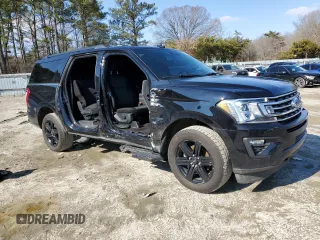 2021 Ford Expedition Max XLT with VIN 1FMJK1JT5MEA75357, listed as a Copart auction lot 44400205 with 146,235 mi miles and Salvage Title. Bid and sale history available at DreamBid. Image 4.