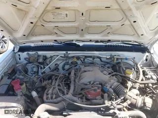 2000 Nissan Frontier 2WD XE with VIN 1N6ED27T0YC387758, listed as a IAAI auction lot 41981132 with 247,214 mi miles. Bid and sale history available at carsss.com. Image 10.