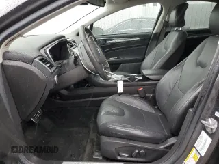 2016 Ford Fusion Titanium Hybrid z VIN 3FA6P0RU5GR356987, wystawiony jako Copart lot #48211775 z przebiegiem 145 192 mil mil oraz Szkoda całkowita • Salvage title. Historia ofert i sprzedaży dostępna na DreamBid. Obrazek 7.