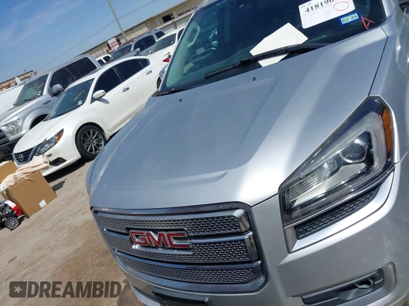 2014 GMC Acadia Denali z VIN 1GKKRTKD0EJ192610, wystawiony jako IAAI lot #41819095 z przebiegiem 121 075 mil mil oraz . Historia ofert i sprzedaży dostępna na DreamBid. Obrazek 12.