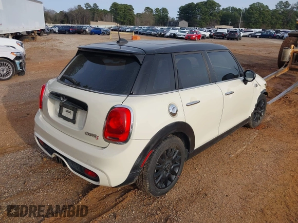 2015 MINI Hardtop 4 Door S z VIN WMWXU3C50F2B59450, wystawiony jako IAAI lot #41271841 z przebiegiem 70 719 mil mil oraz . Historia ofert i sprzedaży dostępna na DreamBid. Obrazek 4.