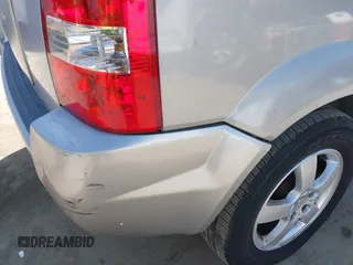 2005 Hyundai Tucson GL with VIN KM8JM12B95U097899, listed as a IAAI auction lot 41953290 with 111,090 mi miles. Bid and sale history available at carsss.com. Image 6.