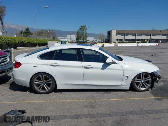 2017 BMW 4 Series 430i with VIN WBA4F7C31HG789340, listed as a IAAI auction lot 41871217 with 97,971 mi miles and . Bid and sale history available at DreamBid. Image 13.