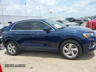 2020 Audi Q3 Premium z VIN WA1AECF34L1104864, wystawiony jako IAAI lot #42266118 z przebiegiem 43 024 mil mil oraz . Historia ofert i sprzedaży dostępna na DreamBid. Obrazek 14.