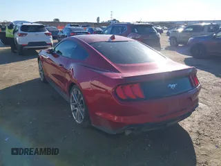 2021 Ford Mustang EcoBoost with VIN 1FA6P8TH8M5129026, listed as a IAAI auction lot 41451125 with 52,018 mi miles. Bid and sale history available at carsss.com. Image 3.