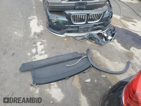 2015 BMW X1 xDrive28i with VIN WBAVL1C58FVY39591, listed as a Copart auction lot 73548684 with 152,569 mi miles and Salvage Title. Bid and sale history available at carsss.com. Image 12.