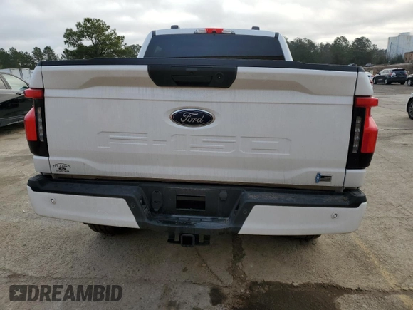 2023 Ford F-150 Lightning Pro z VIN 1FTVW1ELXPWG63466, wystawiony jako Copart lot #43397005 z przebiegiem 8 852 mil mil oraz Szkoda całkowita • Salvage title. Historia ofert i sprzedaży dostępna na DreamBid. Obrazek 6.