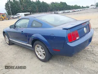 2007 Ford Mustang Deluxe z VIN 1ZVFT80N975270219, wystawiony jako IAAI lot #42364898 z przebiegiem 183 462 mil mil oraz . Historia ofert i sprzedaży dostępna na DreamBid. Obrazek 3.