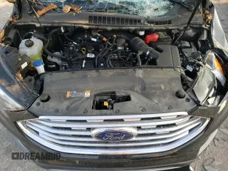 2020 Ford Edge SEL с VIN 2FMPK4J90LBB57040, выставлен на аукционе Copart как лот 62237005 с пробегом Не указан миль и Списание • Salvage title. История ставок и продаж доступна на DreamBid. Изображение 12.