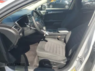 2017 Ford Fusion SE z VIN 3FA6P0H74HR164747, wystawiony jako Copart lot #56139855 z przebiegiem 105 769 mil mil oraz Szkoda całkowita • Salvage title. Historia ofert i sprzedaży dostępna na DreamBid. Obrazek 7.