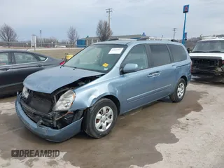 2010 Kia Sedona LX with VIN KNDMG4C34A6324741, listed as a IAAI auction lot 41665347 with 135,904 mi miles. Bid and sale history available at carsss.com. Image 2.