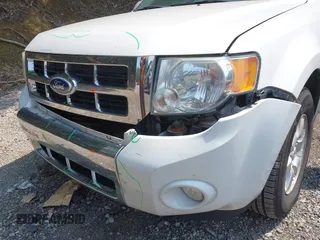 2010 Ford Escape Limited with VIN 1FMCU9EG8AKC42841, listed as a IAAI auction lot 42492355 with 159,939 mi miles and . Bid and sale history available at DreamBid. Image 15.