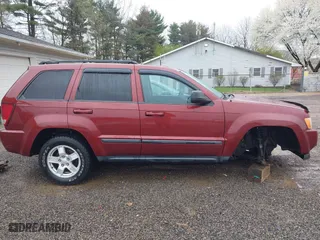 2007 Jeep Grand Cherokee Laredo with VIN 1J8GR48K27C583108, listed as a IAAI auction lot 41994761 with 188,171 mi miles. Bid and sale history available at carsss.com. Image 14.